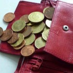 Weltverbrauchertag Portemonnaie mit Kleingeld